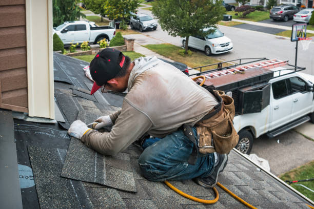 Professional Gutter Repair And Installation technician working in Edgewood, PA
